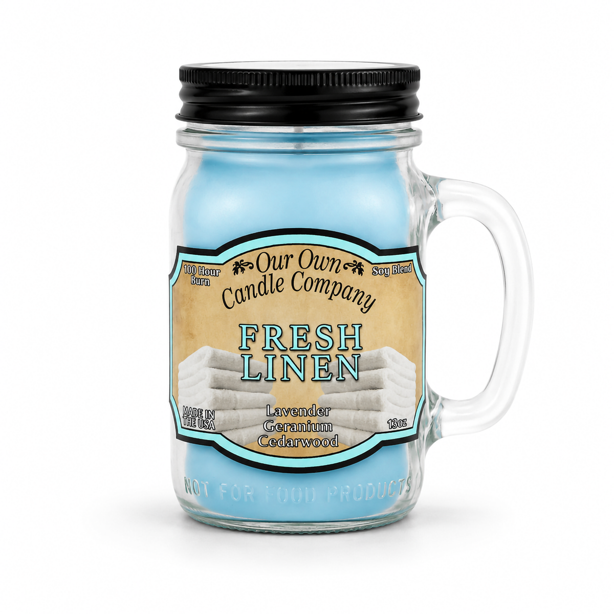 Our Own Candle Company Fresh Linen scented candle in a 13 oz glass mason jar with lid
